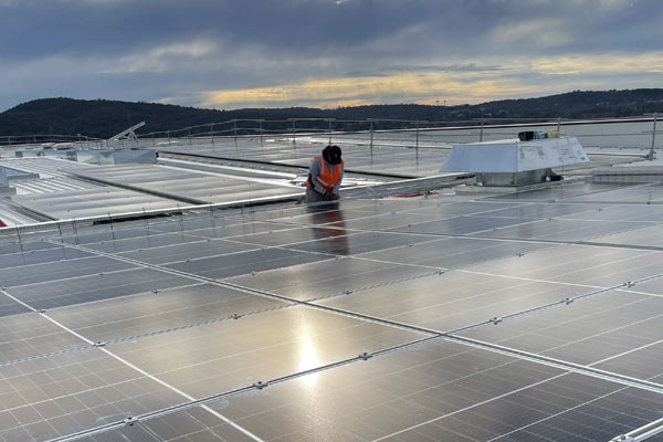 Solar panel installation by Meta Electrical & Solar β Canberra ACT and South Coast NSW Solar panel installers on commercial roof Canberra and South Coast NSW